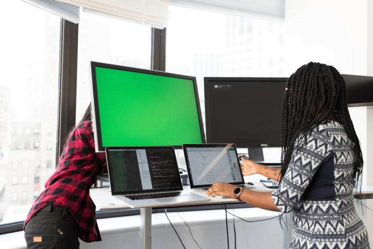 IT Management Workstation with 3 monitors